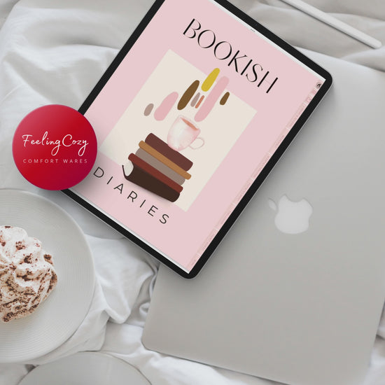 The Bookish Diaries digital reading journal open on iPad beside a coffee cup, lifestyle preview by Feeling Cozy