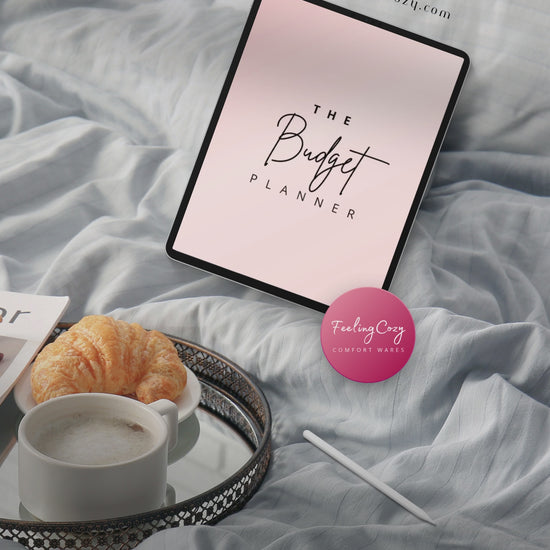 Pink aesthetic digital budget planner flipthrough on iPad in GoodNotes — annual goals, monthly budgets, bill tracking, debt snowball, and savings challenge pages by Feeling Cozy