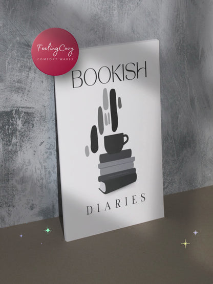 Black and white Bookish Diaries printable reading journal standing upright, minimalist lifestyle preview, print plan enjoy by Feeling Cozy